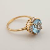 Золотое кольцо с топазом и фианитами 11780top, 17 размер