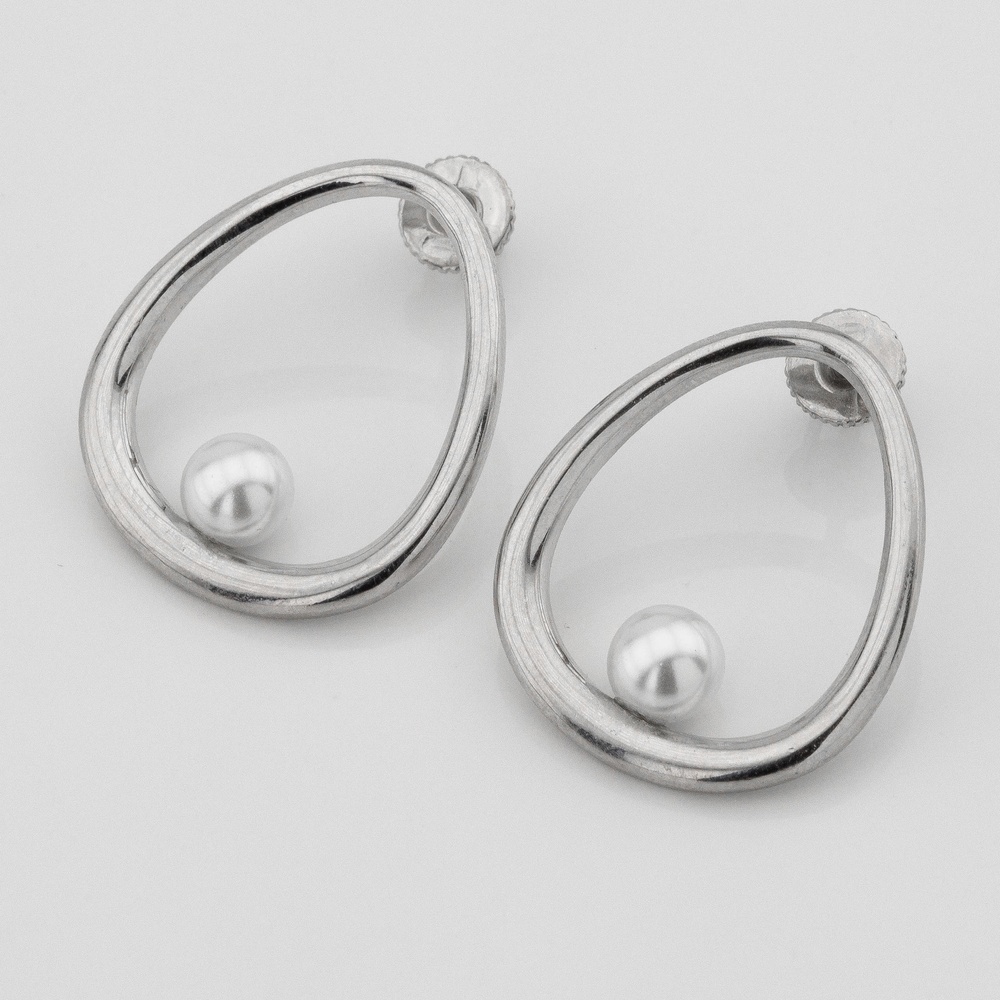 Срібні гвоздики з перлами
Овали 121089-4
