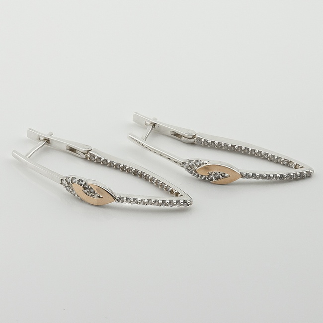 Срібні сережки висячі з фіанітами із золотими накладками с970ф